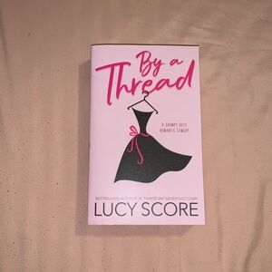 By A Thread book by Lucy Score